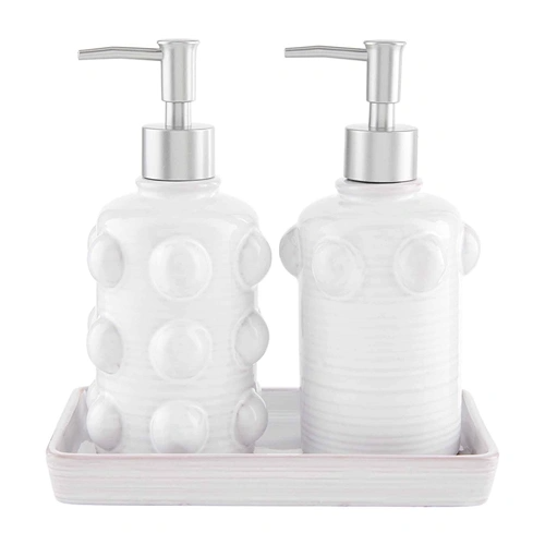 Three-piece decorative soap set with glazed terracotta pumps featuring beaded patterns on a matching tray.
