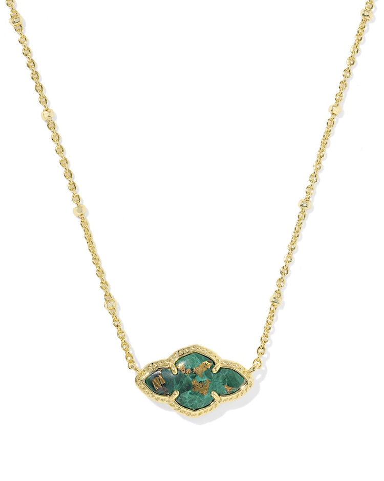 Abbie Pendant Necklace featuring a green stone with gold flecks on a gold-tone chain.