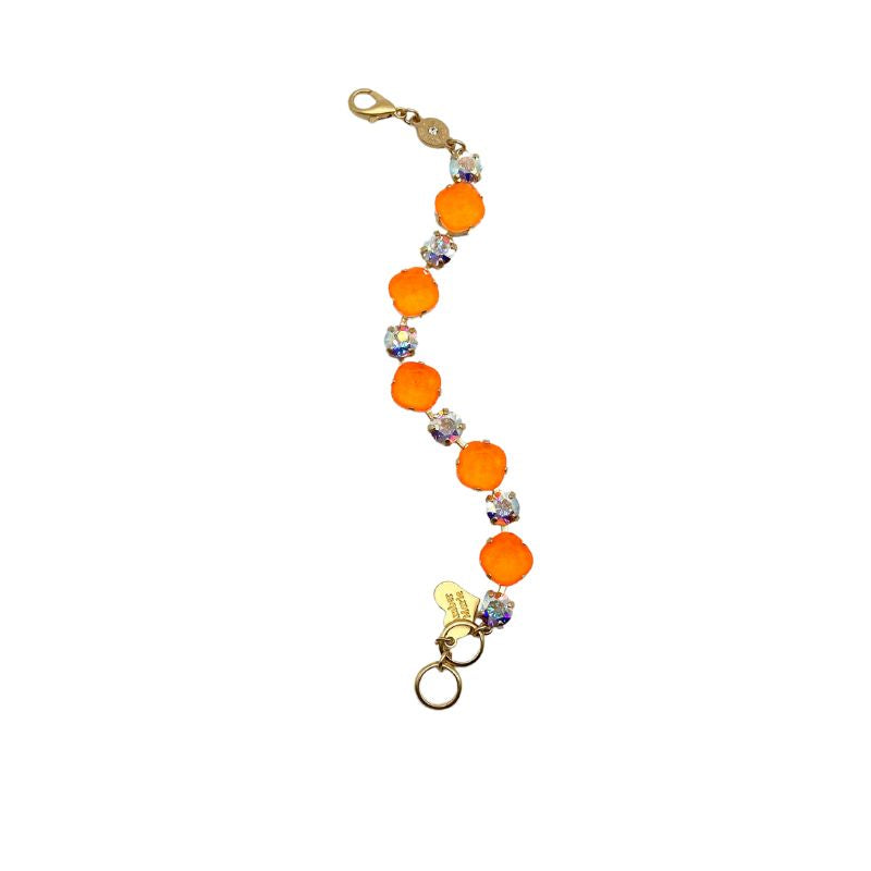 Gold Premier Bracelet by Stilwater featuring a sleek gold-tone chain with an oval pendant and small accent stones.