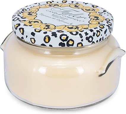 A large 22oz Tyler candle in a clear glass jar with an off-white wax and black wick.