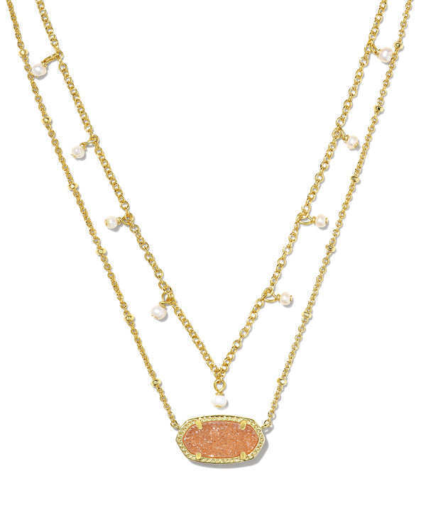 Elisa Pearl Multi Strand Gold Necklace with a peach druzy pendant and small white pearl accents.