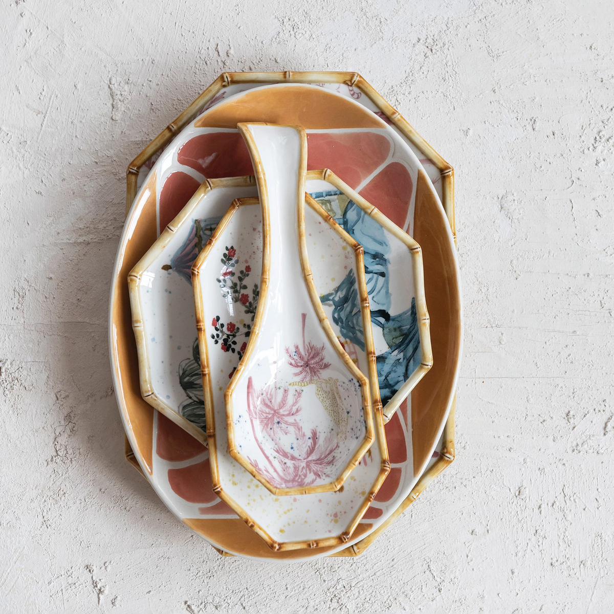 Spoon rest with palm tree motif on a cheetah print surface featuring bamboo-style edge.