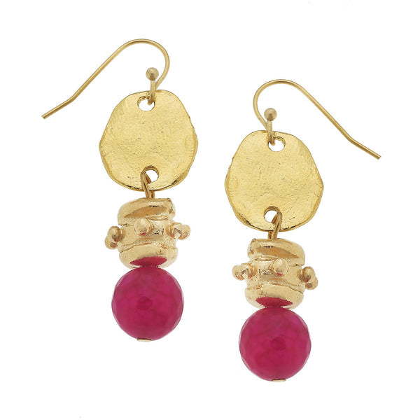 Bentley Earrings featuring hammered 24K gold discs and faceted red coral beads on gold hooks.