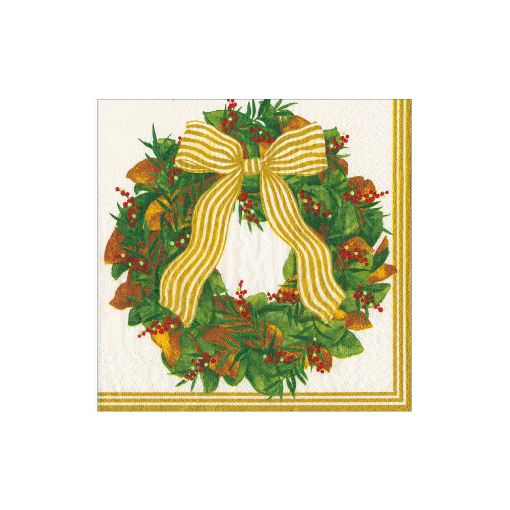 Triple-ply cocktail napkins featuring a magnolia wreath pattern in soft green and cream tones.