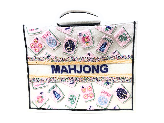 White beaded tote bag featuring pink mahjong tile designs and the word MAHJONG in blue beads.
