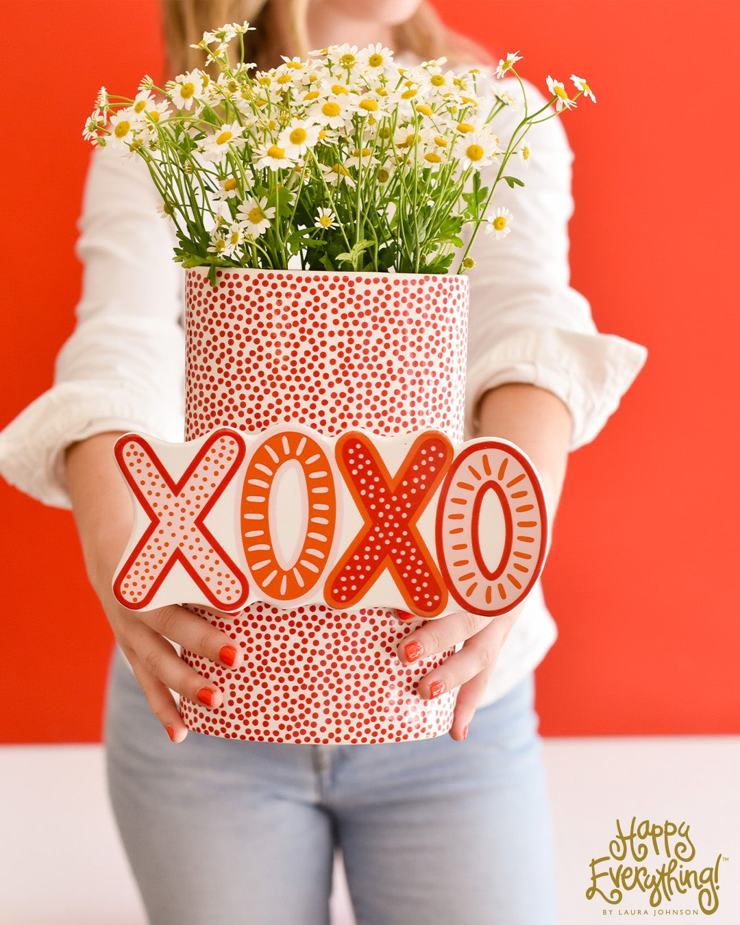 Ceramic red vase with small dot pattern on big oval silhouette