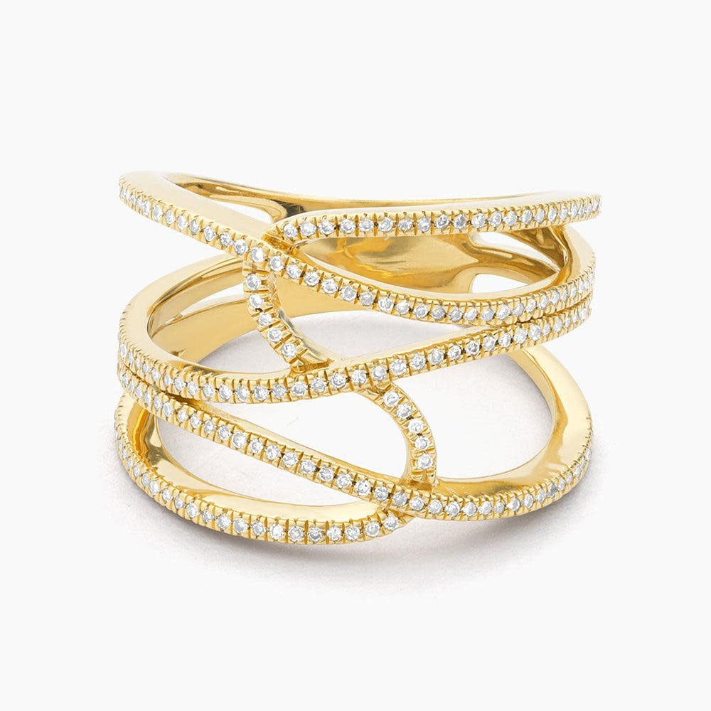 Silver statement ring with a wide band featuring brilliant diamonds representing interconnection.