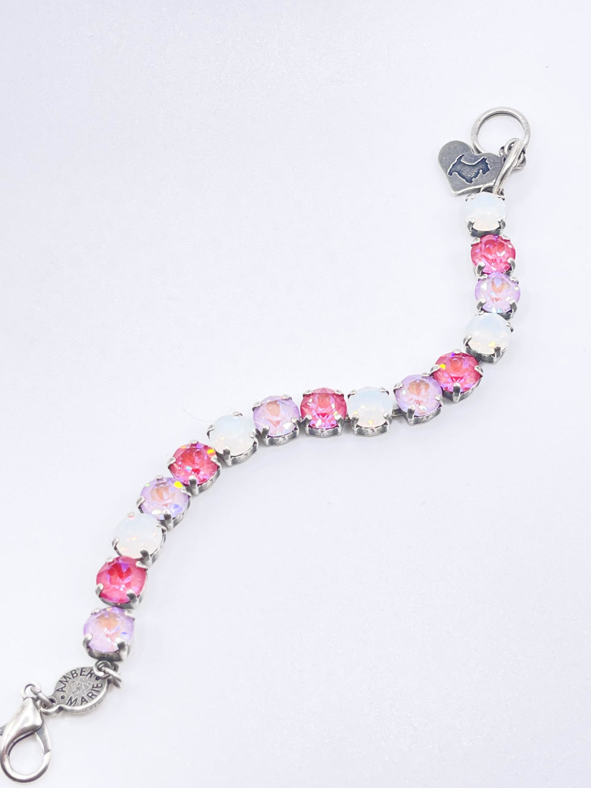 Classic Malibu bracelet featuring lavender, lilac, white, and light green stones with an amber tag heart charm.