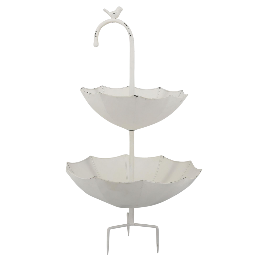 Two-tiered white metal umbrella bird feeder with a bird figurine on the curved top handle.