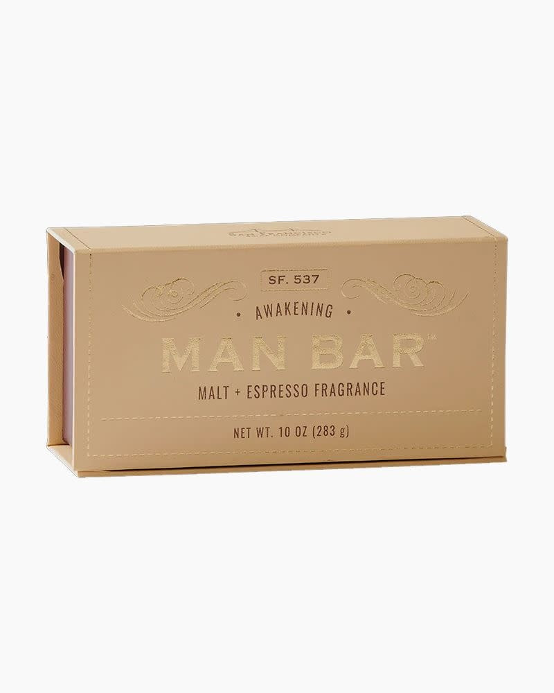Malt & Espresso scented man bar soap in a rectangular shape with light brown and beige tones.