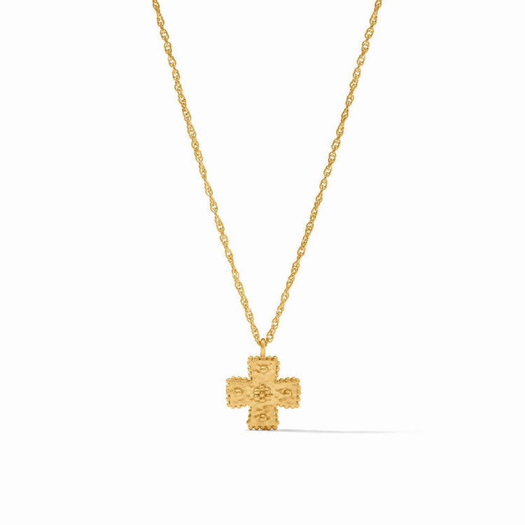Delicate gold necklace featuring a hand-hammered cross pendant with golden bead accents and an adjustable chain.