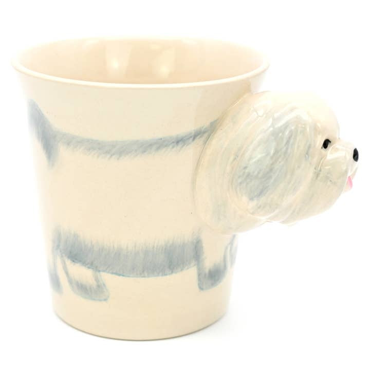 White ceramic mug with a Maltese dog silhouette painted on the side.