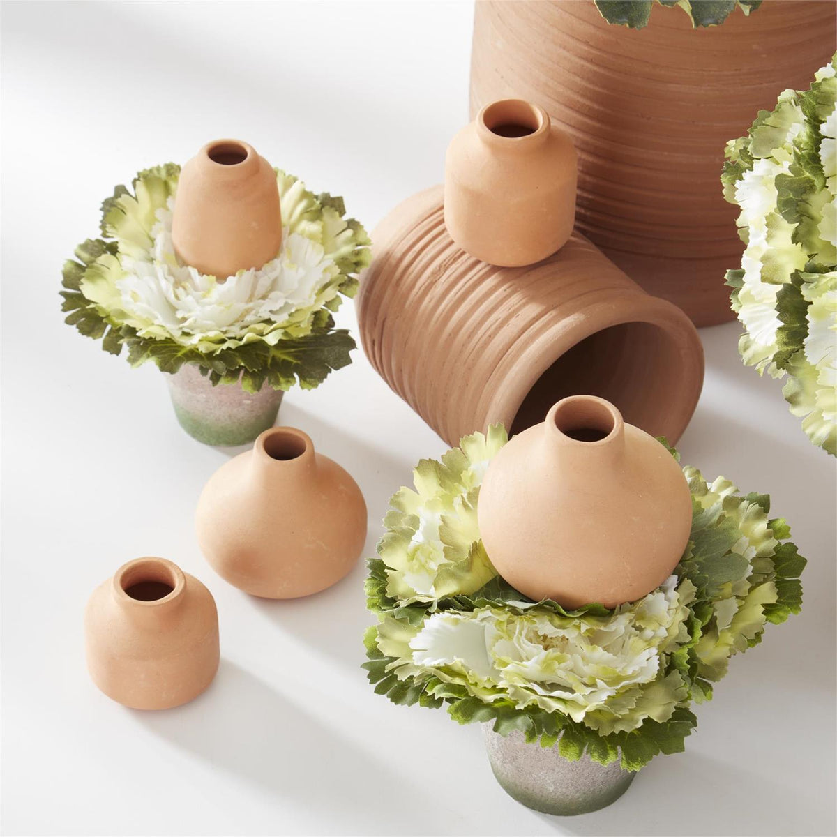 6-inch artificial cabbage in a green fabric pot with paper liner