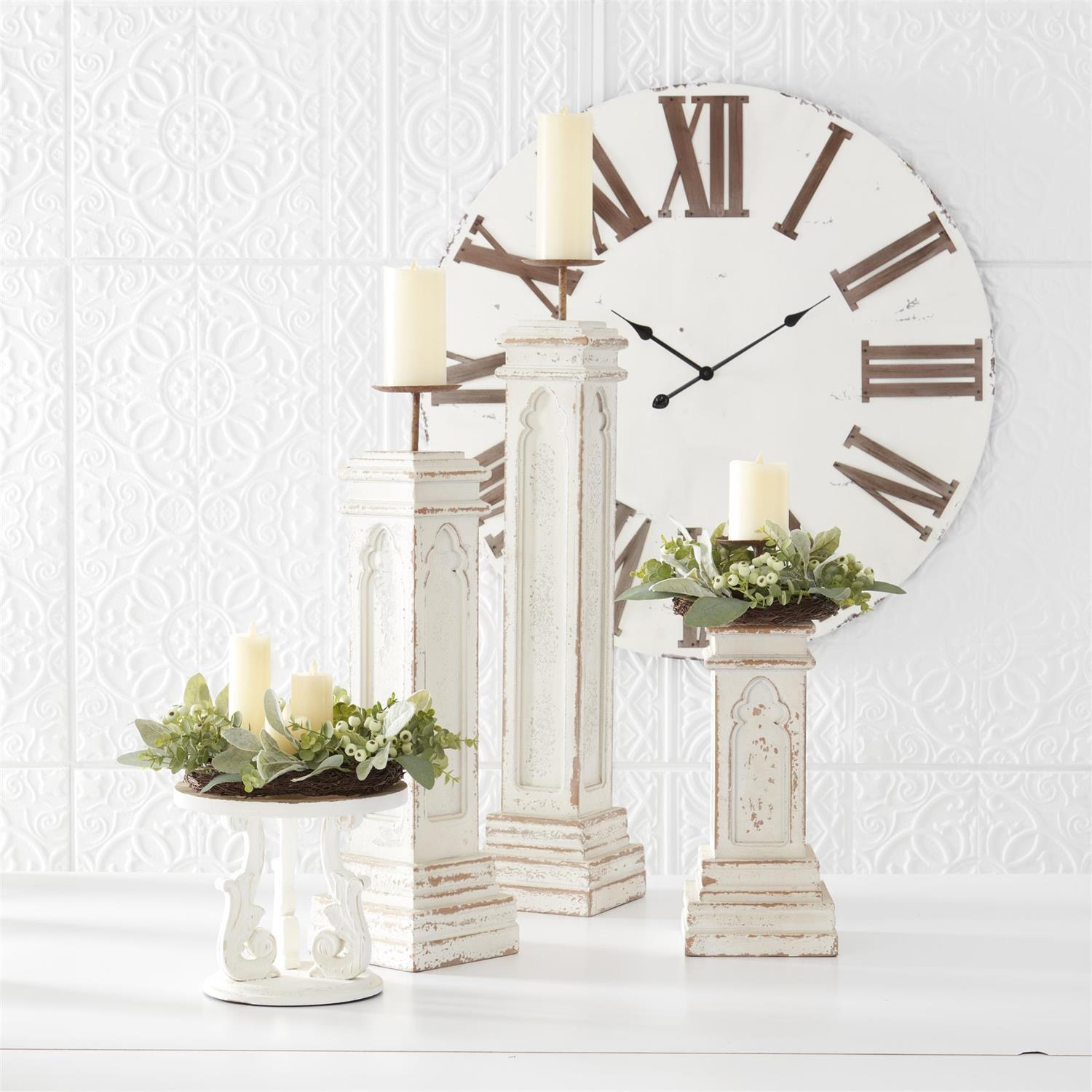Whitewashed iron candleholders with square resin bases