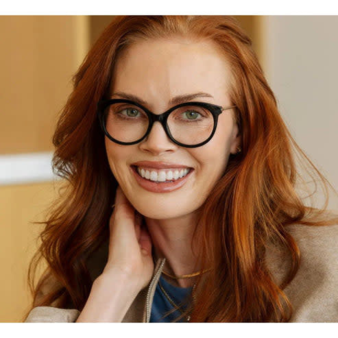 Black Margot eyeglasses with gold temples featuring blue light focus lenses.