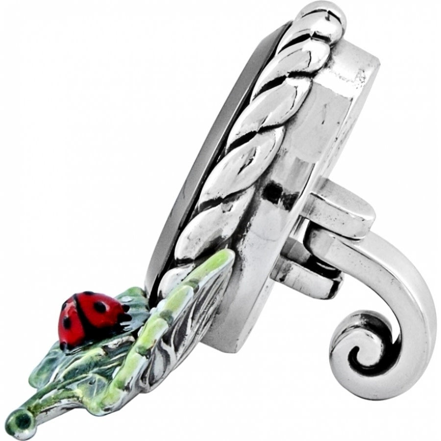 Side view of a Marvels Clock with multi-colored enamel finish, swivel arm mechanism, and circular face.