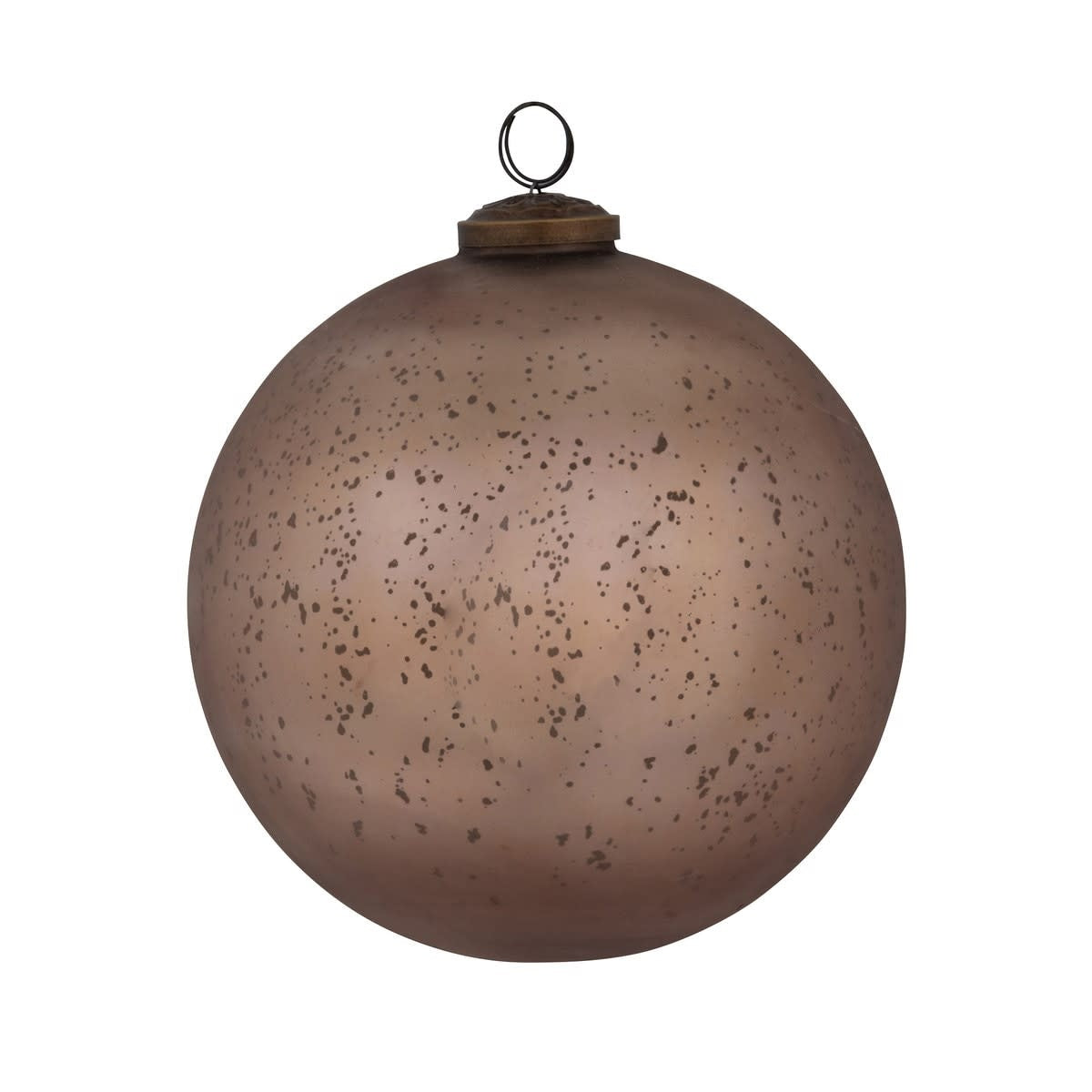 Matte light gold glass ball ornament with vintage holiday sparkle on a cream and sage green background.