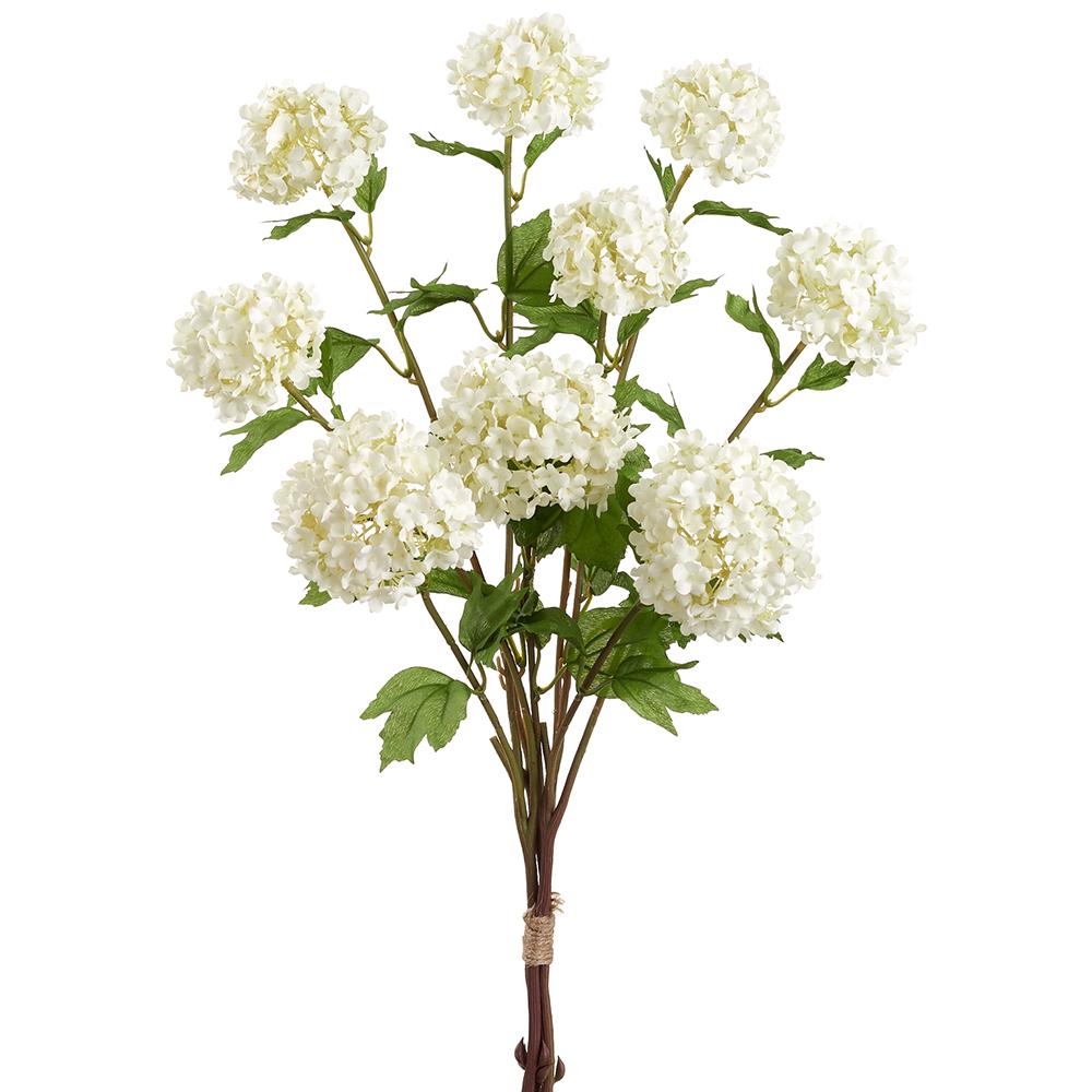 A bundle of artificial white snowball flowers with green leaves and brown stems tied with twine.