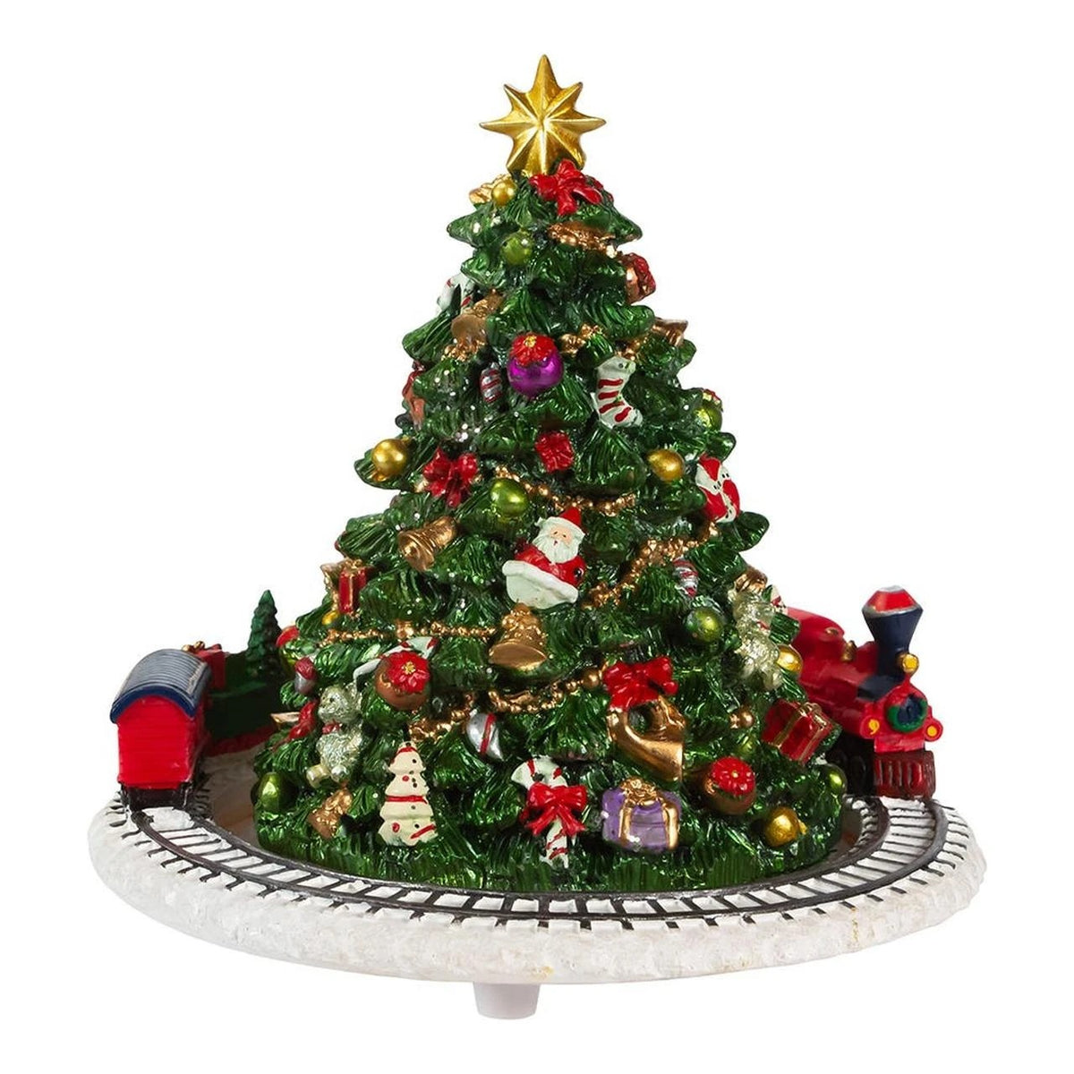 Christmas tree music box with a revolving red train on a circular track and a gold star topper.