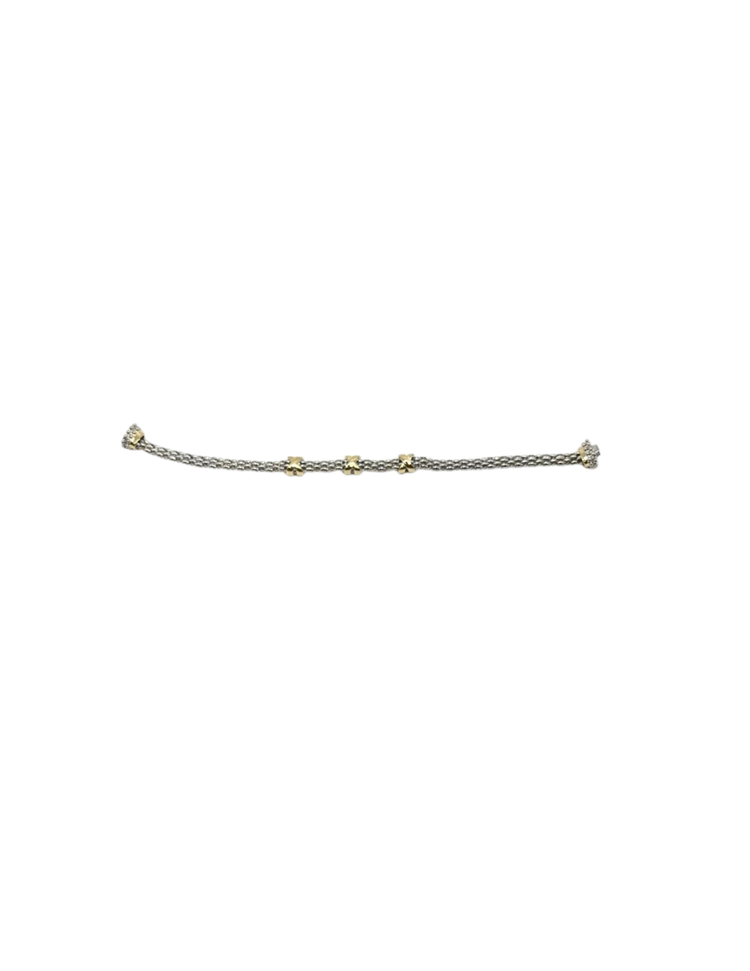 Silver mesh bracelet with three gold X-shaped stations and diamond-accented end caps.