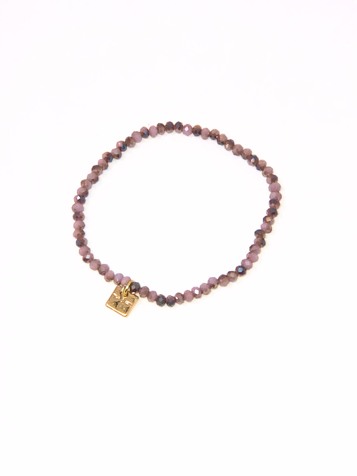 Stretchy bracelet with faceted glass beads in colorful patterns.