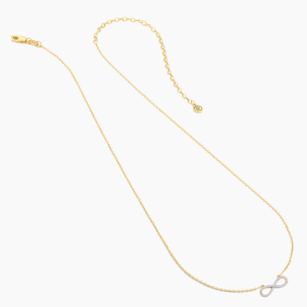 Live Limitless Pendant Necklace with a gold chain and diamond-encrusted infinity symbol pendant.