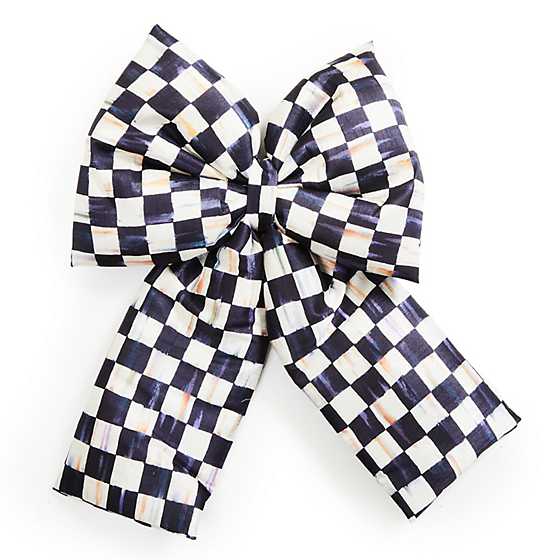 Large decorative bow with a black and white hand-painted Courtly Check pattern.