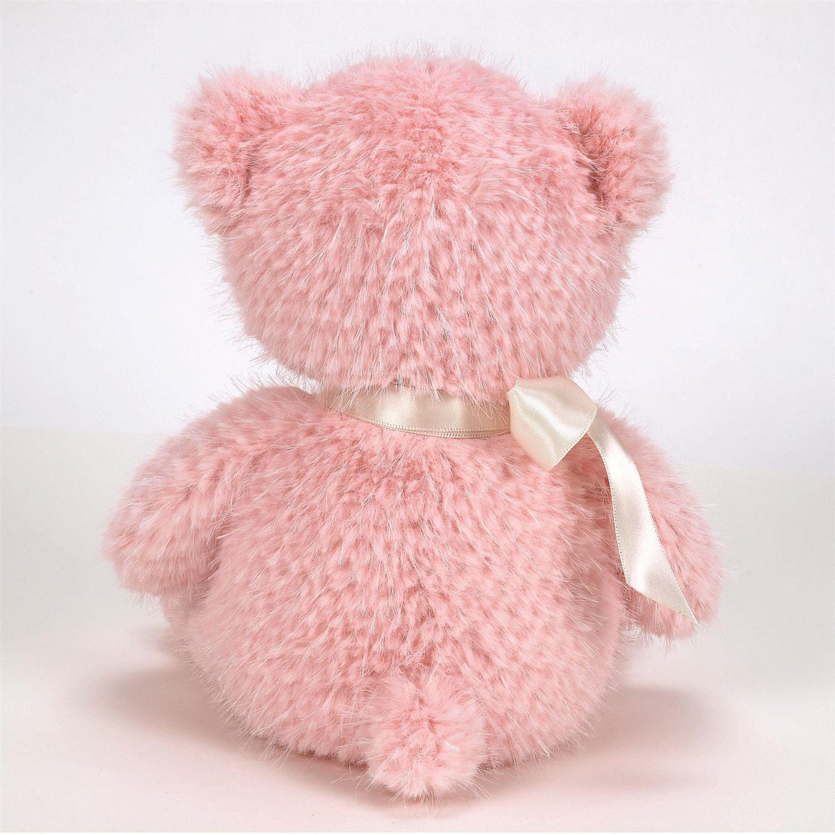 Lil' Sprinkles plush bear in soft gray with a pink bow tie and glittery sprinkled details on its ears.