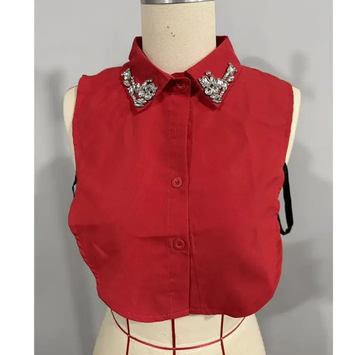 Red detachable shirt collar with sparkling diamond-studded embellishments on the collar points.