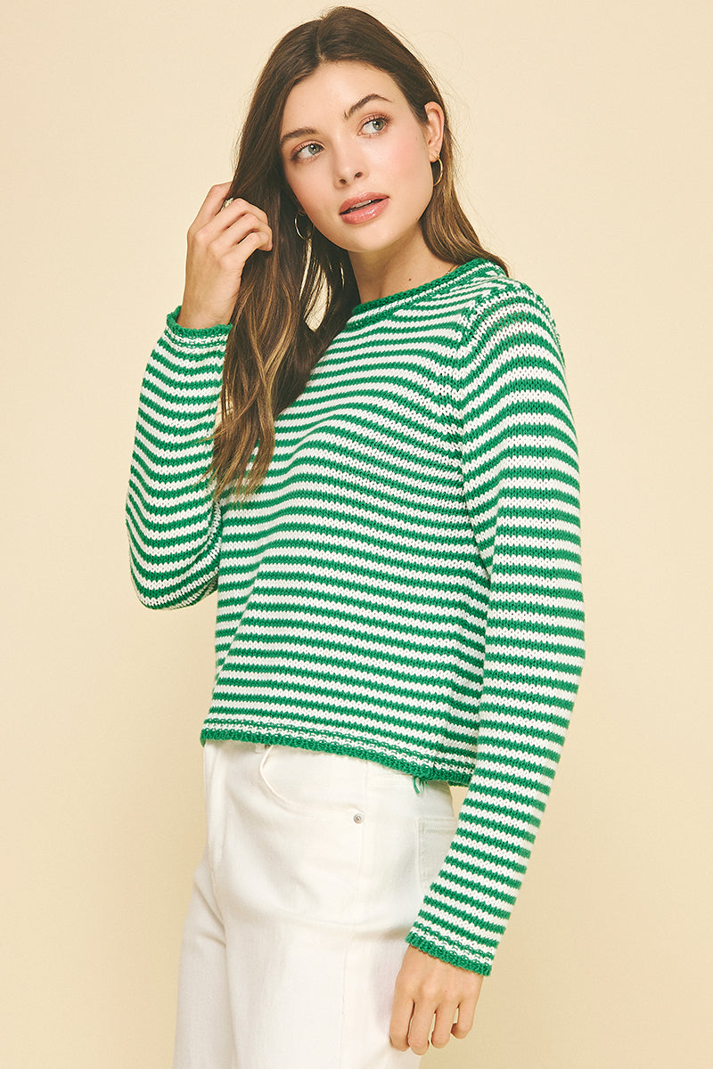 Model wearing a small Camille striped crew neck sweater in cotton acrylic blend with long sleeves.