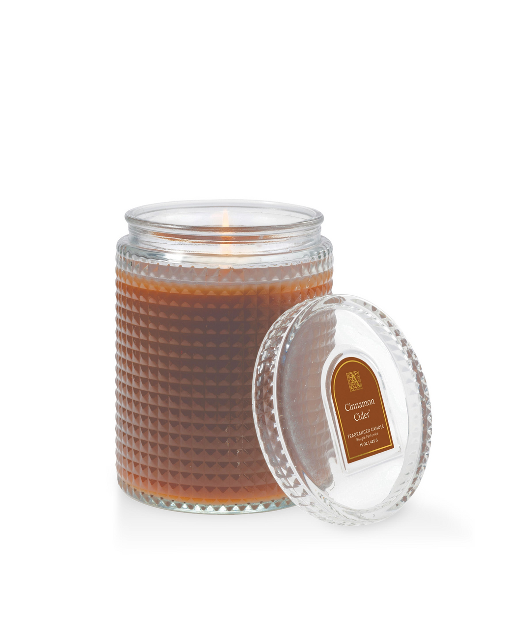 Cinnamon Cider 15 oz candle in a brown textured glass jar with a lit wick and matching glass lid.