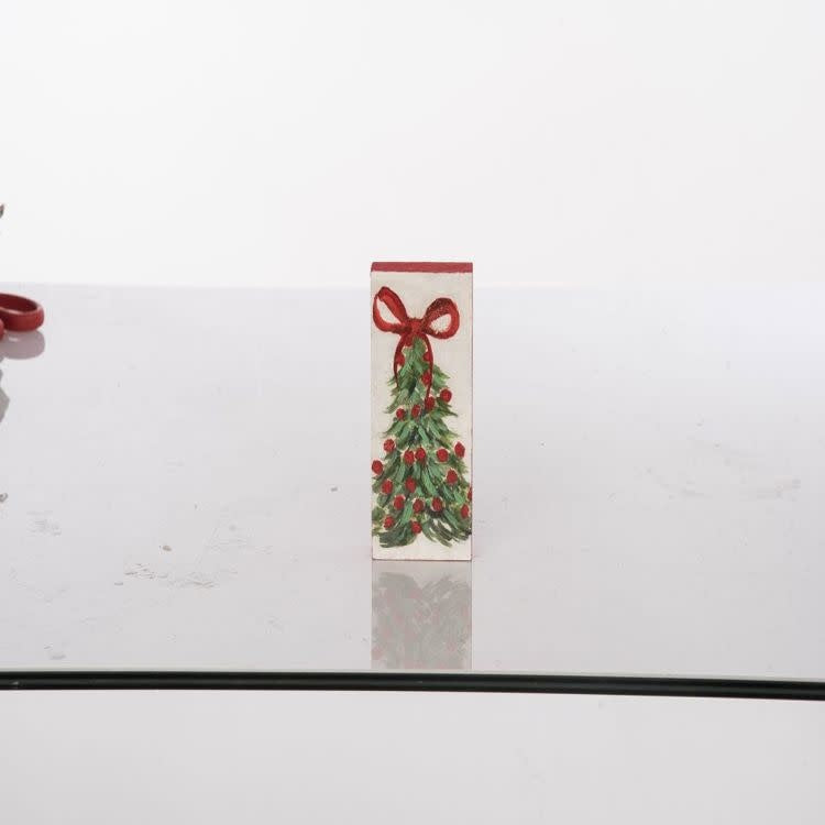 Hand-painted MDF block shaped like a green holiday tree with brown trunk base.