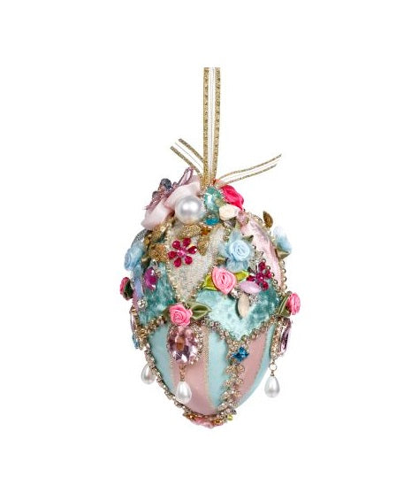 Six-inch foam Easter egg covered in fabric with jeweled floral embellishments on a ribbon hanger.