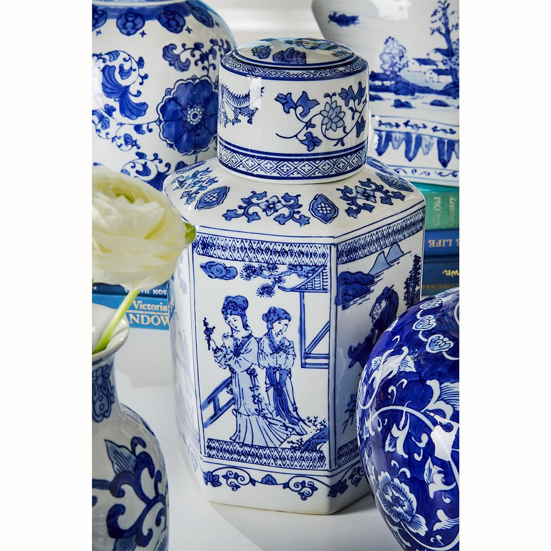 A collection of blue and white Canton ceramic jars and vases with traditional Chinese patterns.