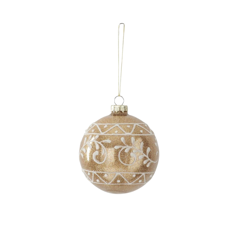 4.5-inch gold glittered glass round ornament with white hand-painted floral and geometric patterns.