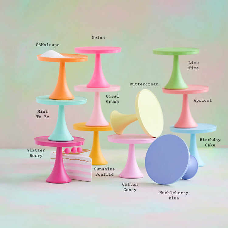 Eight-and-a-half-inch by seven-inch rainbow melamine cake plates with a sliding-prevention silicon ring base.