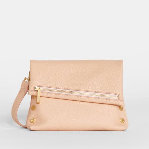 Black leather medium zippered bag with gold rivets, red seam detail, external phone pocket, and optional strap.