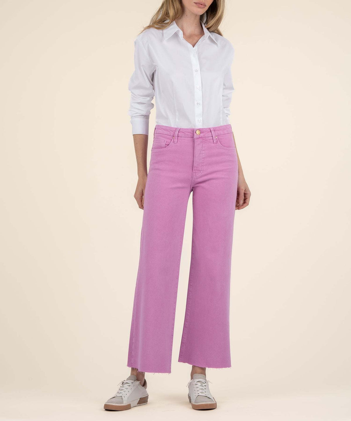 Front view of Peony pink Meg high-rise wide-leg jeans with Fab Ab front pockets and a vintage fading wash.