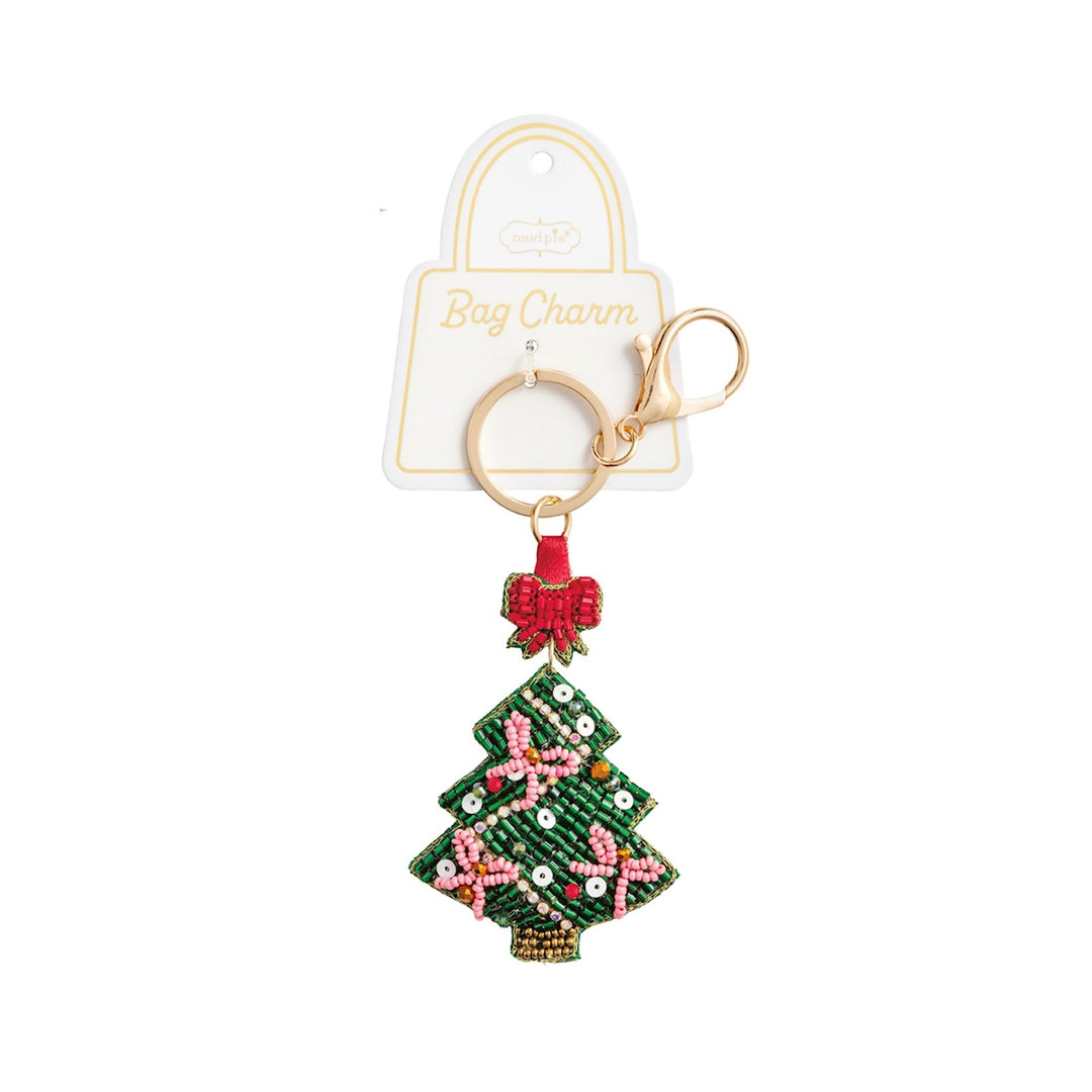 Beaded Christmas tree bag charm with a red bow, gold key ring, and lobster clasp.