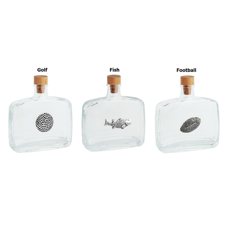 Glass decanter with cast aluminum icon exterior, cork stopper, wooden top, and dimensions of 3.74x4.53x10.81 inches.