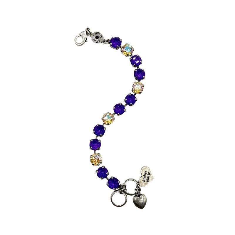 Classic bracelet featuring green, yellow, purple stones with an amber tag heart charm