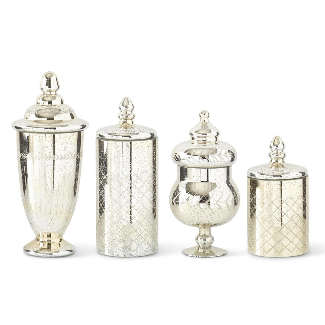 Mercury glass jar with lid featuring a reflective silver finish.