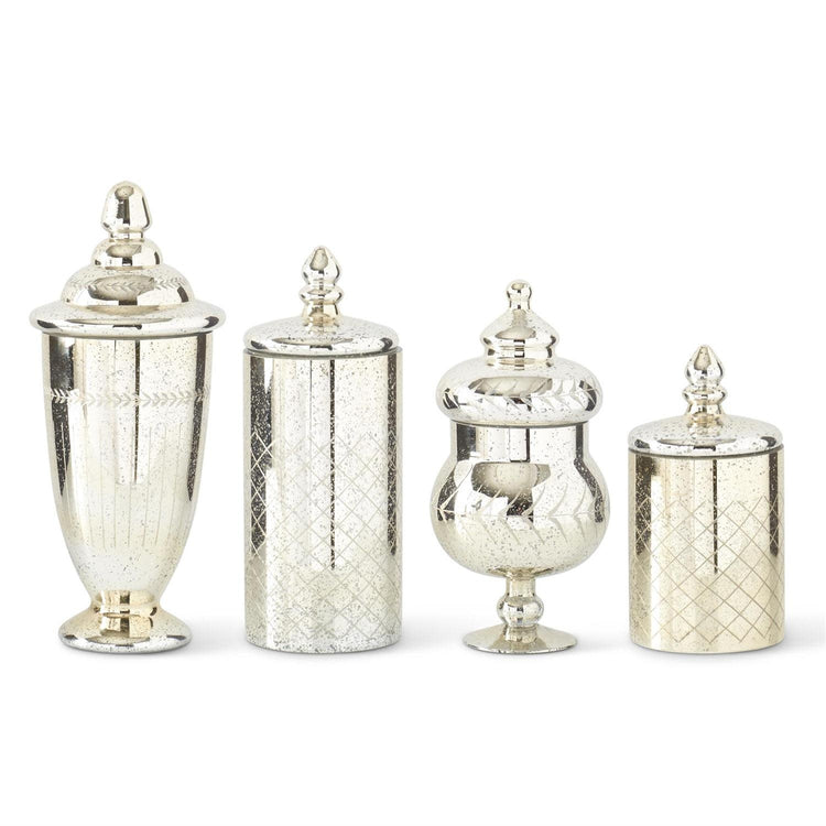 Mercury glass jar with lid featuring a reflective silver finish.