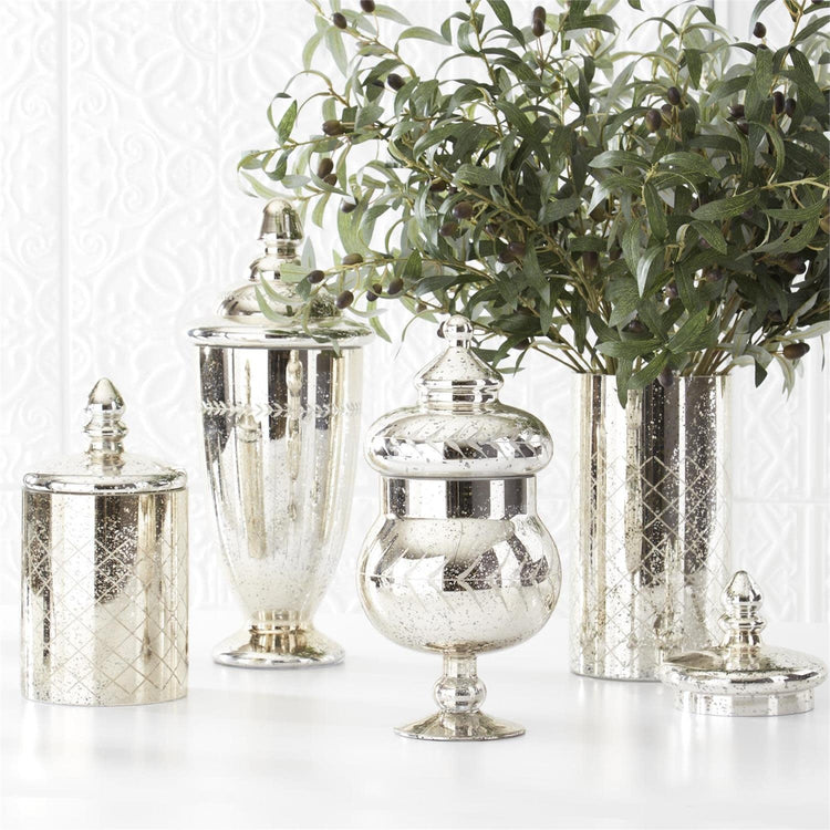 Mercury glass jar with lid featuring a reflective silver finish.