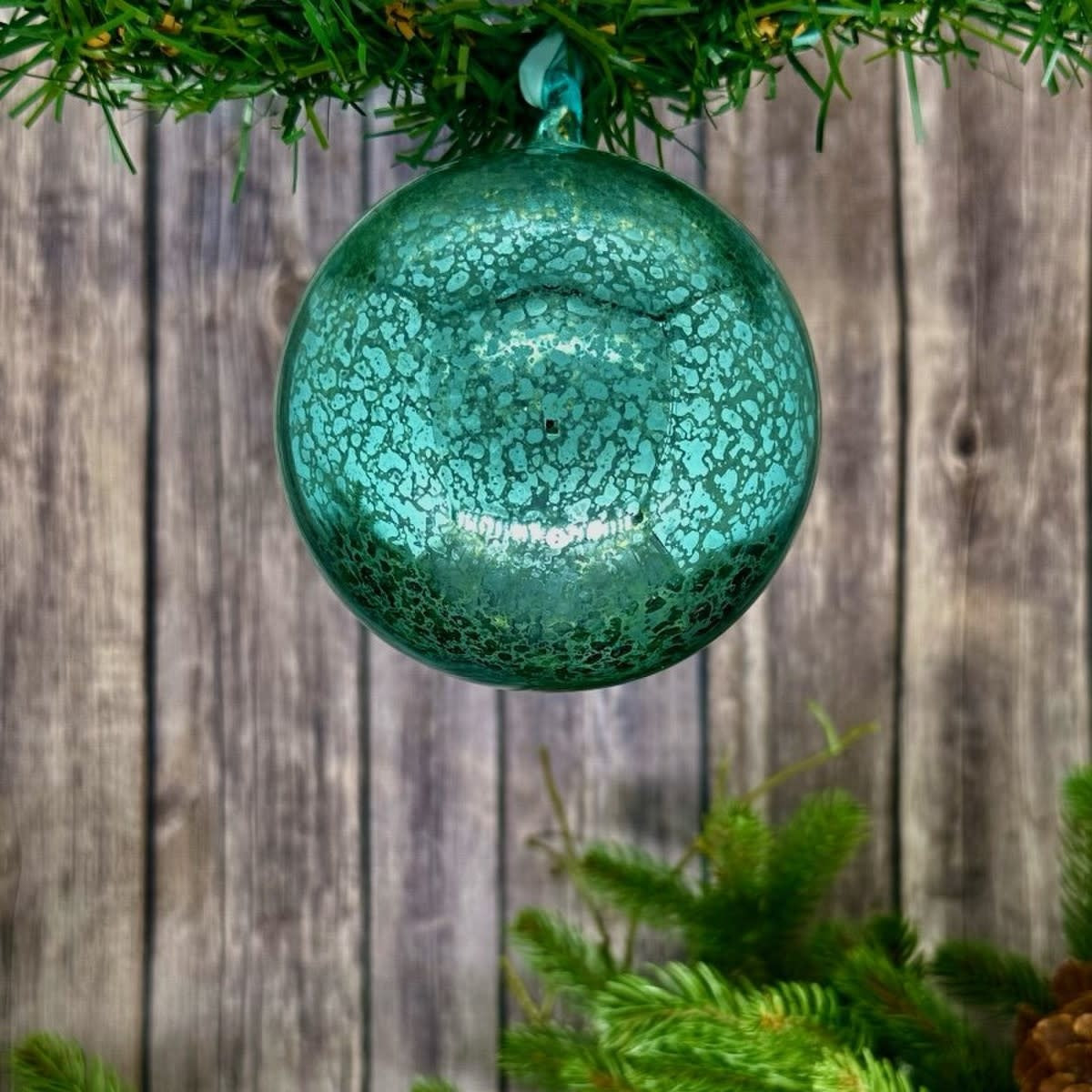 Hand-blown mercury glass ornament with vintage silver finish