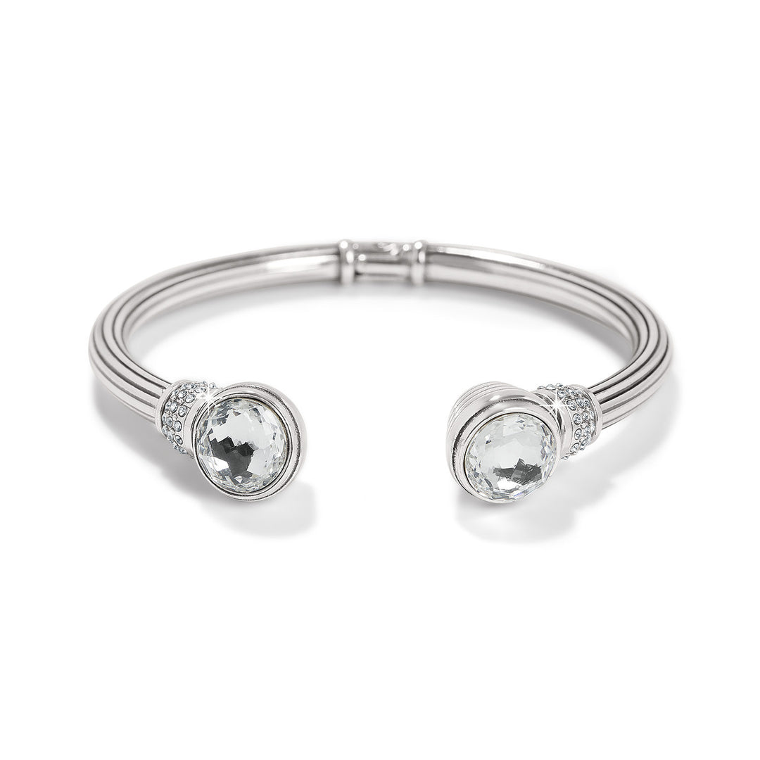 Silver plated hinged bangle with hand-set European crystals in a golden shadow hue and pave crystal cap.