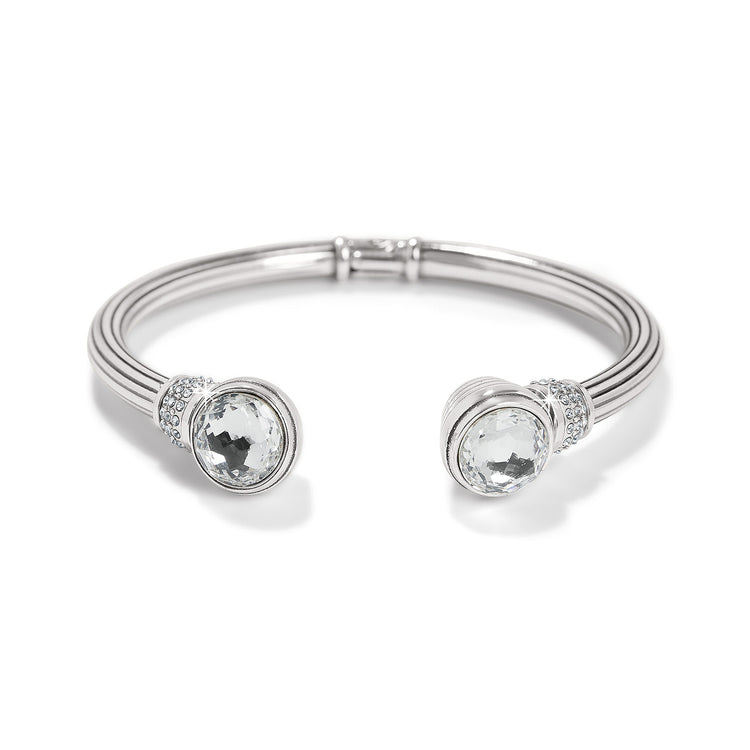 Silver plated hinged bangle with hand-set European crystals in a golden shadow hue and pave crystal cap.