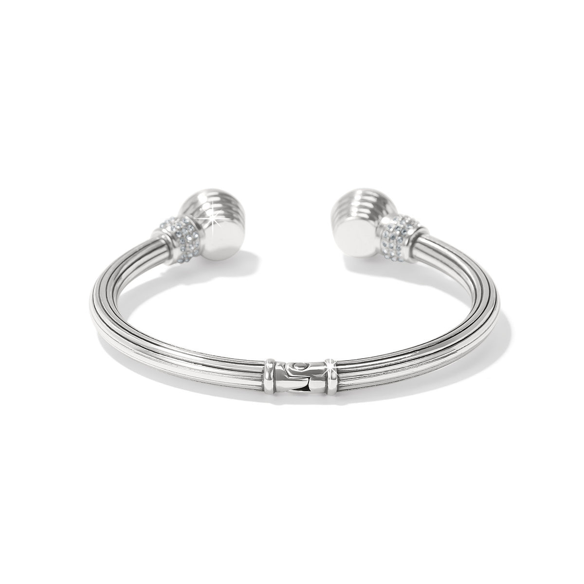 Silver plated hinged bangle with hand-set European crystals in a golden shadow hue and pave crystal accents.