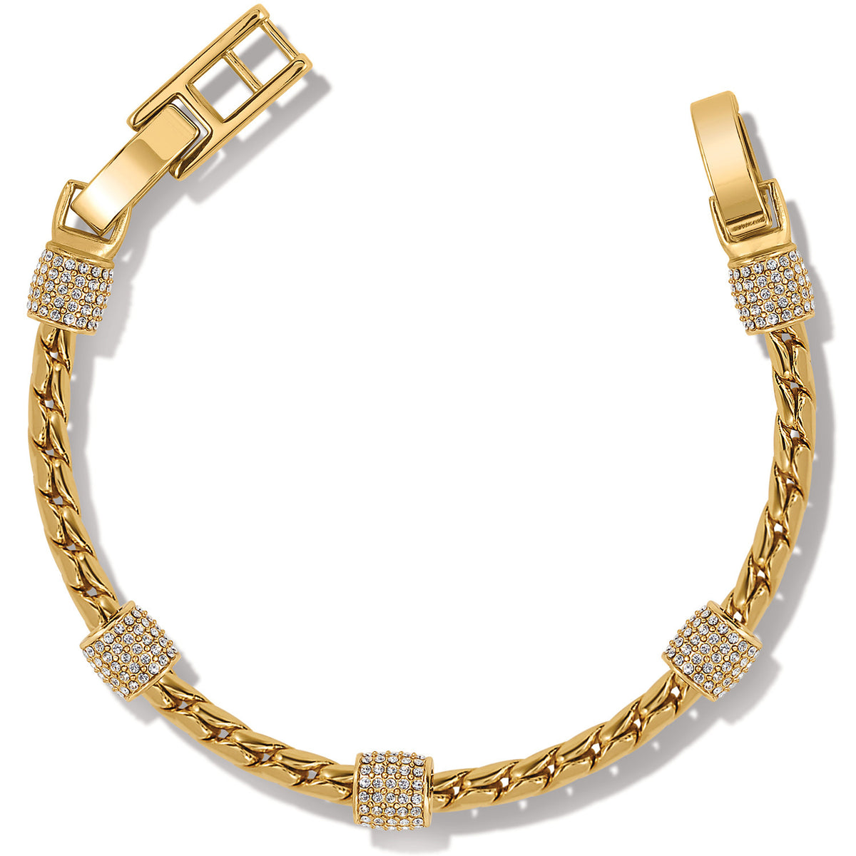 Gold plated adjustable bracelet with crystal stations on a fold-over clasp.