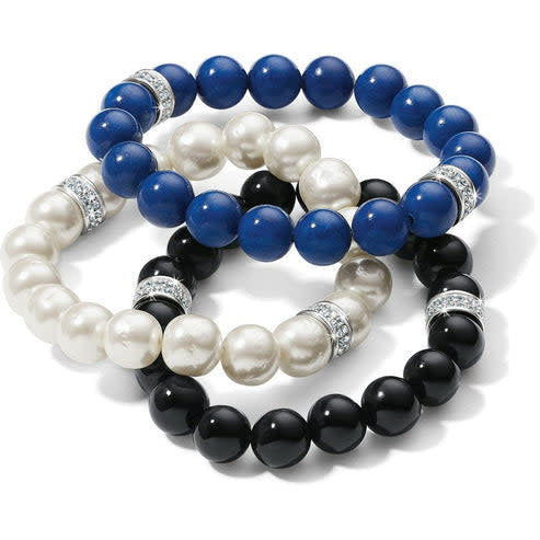 Blue stretch bracelet with silver-plated finish featuring bold beads and pave crystals.